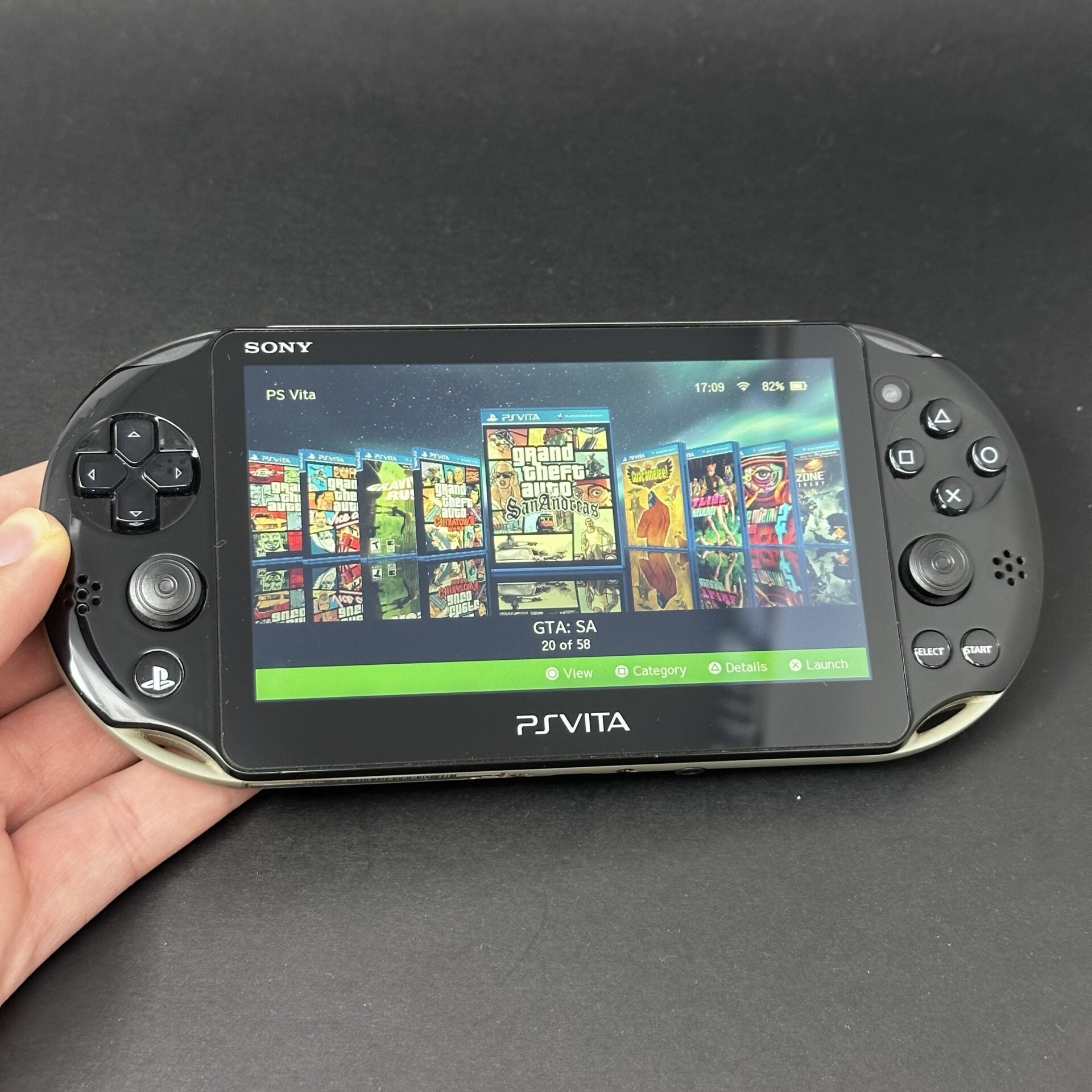 PS Vita Slim (128GB) – 580 Games | Khaki and Black